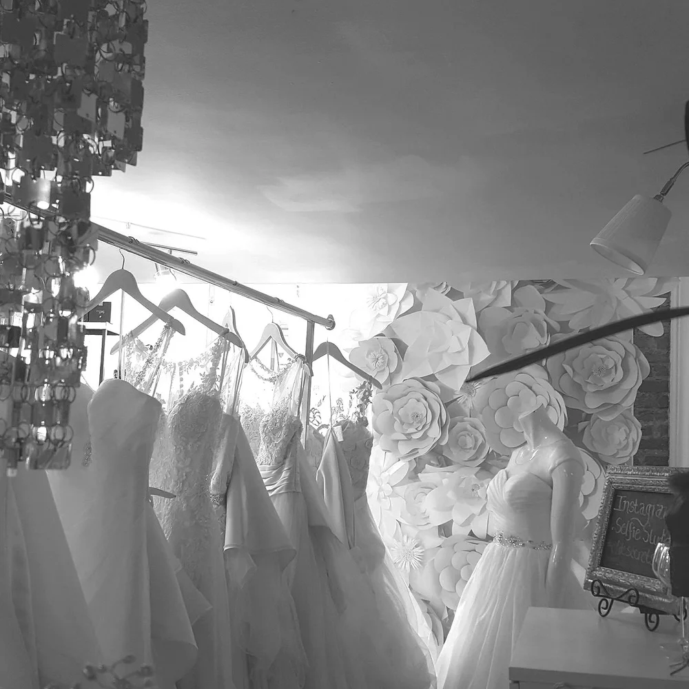 Black and white row of wedding gowns