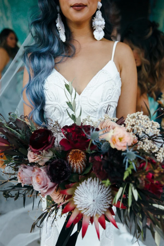 Bride with a deep jewel-tone bouquet