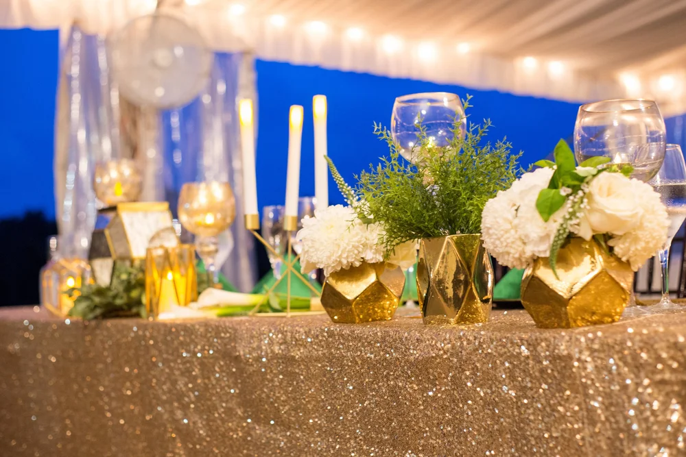Gold sequin linen with candles and florals