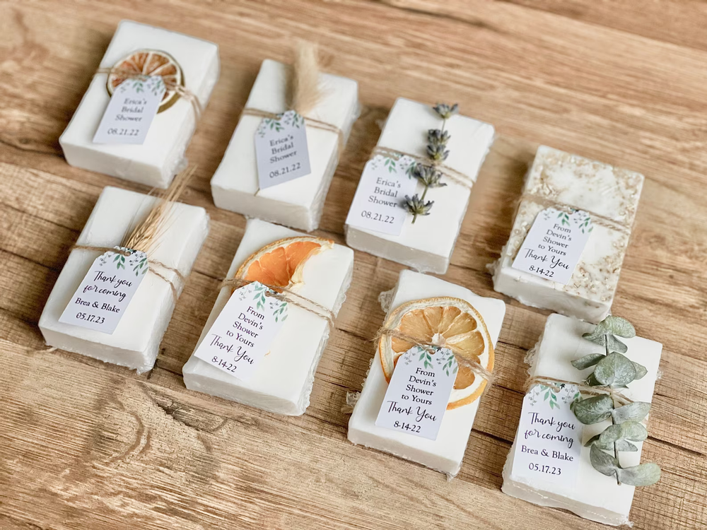 Handwritten place cards on kraft favour boxes