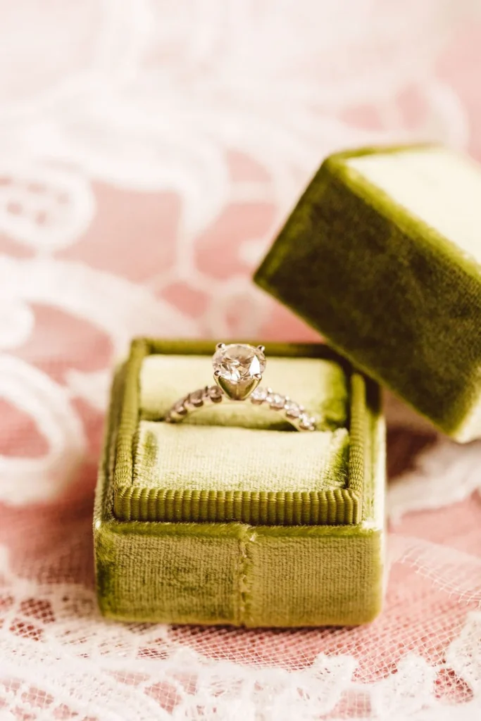 Engagement ring in a chartreuse velvet box