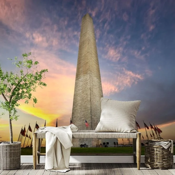 Washington Monument at sunrise with lounge seating