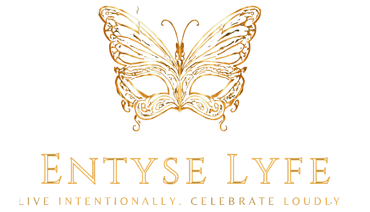 Entyse Lyfe gold butterfly wordmark with the tagline Intentionally Celebrate Love