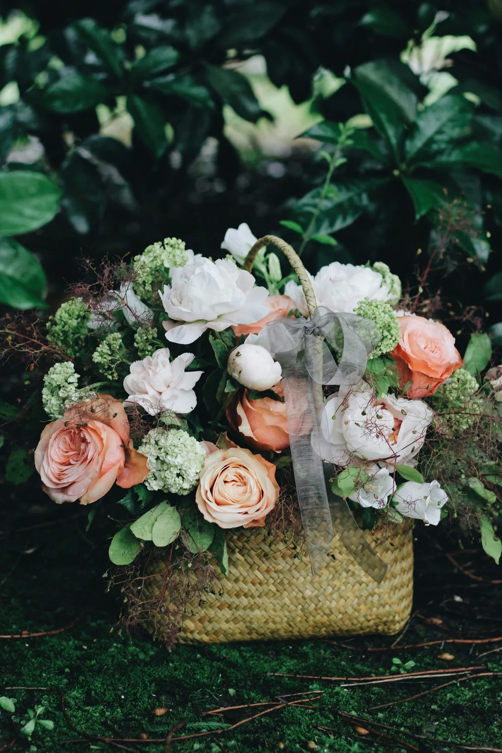 Blush garden rose and succulent arrangement