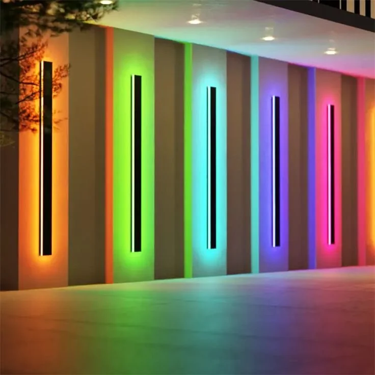 Corridor lit by vertical rainbow coloured LED light bars