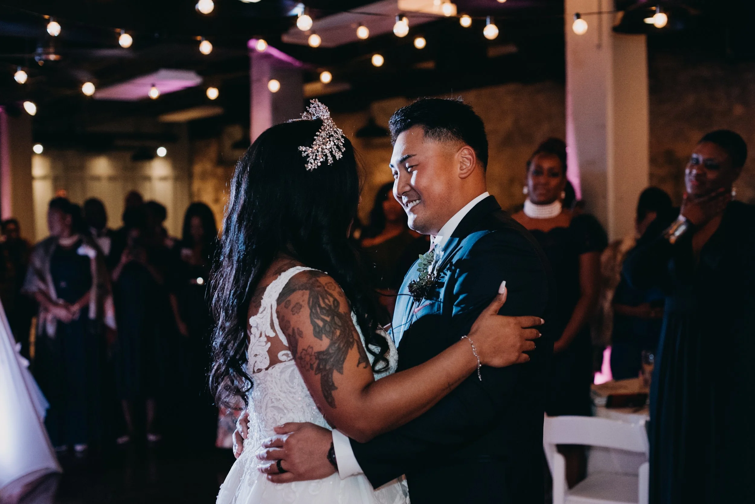 Couple sharing their first dance at the reception