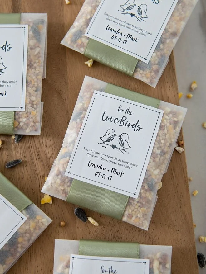 For the Love Birds seed paper favour with sage green envelopes