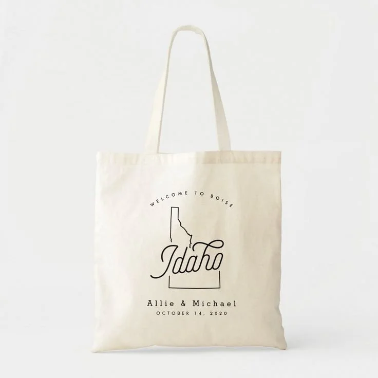 Cotton tote bag welcome gift printed with a state outline and the couple's names